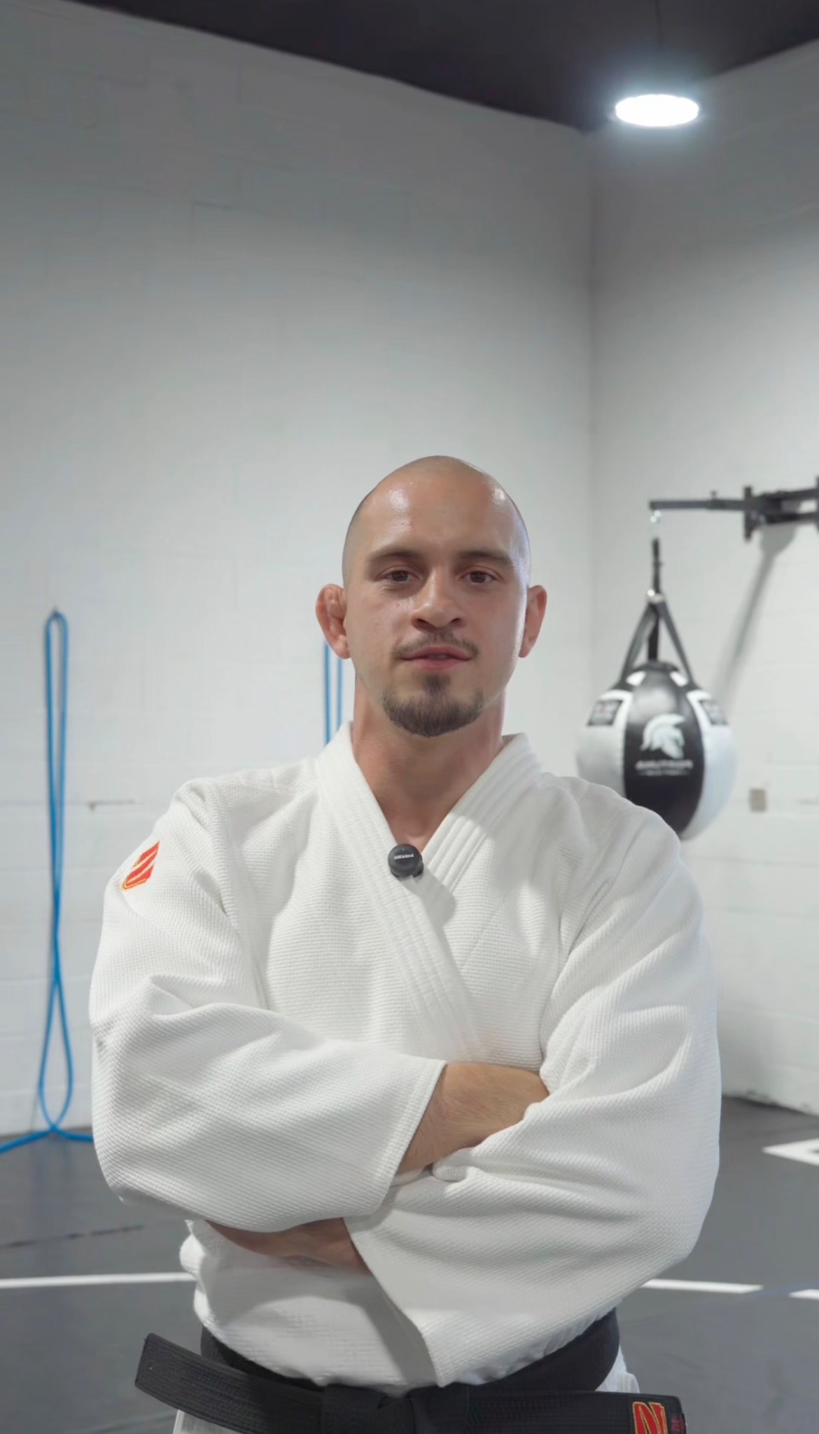 Coach Art in a white judo gi